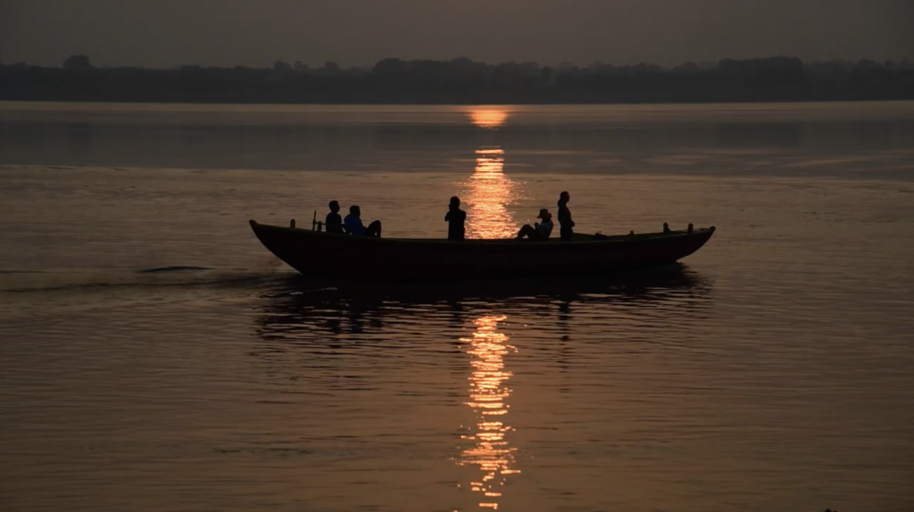 boat on water at sunset